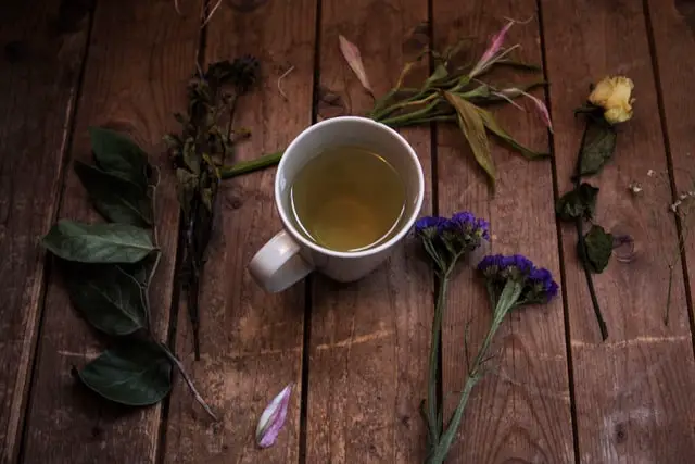 green tea in white ceramic mug