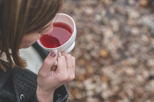 drinking a cup of tea