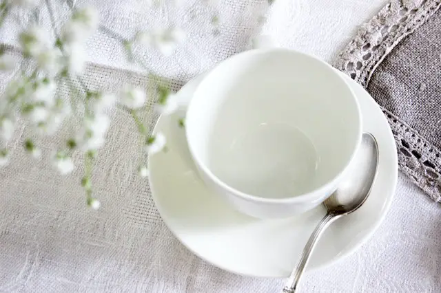 white ceramic tea cup