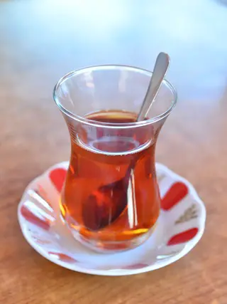 small glass of orange pekoe