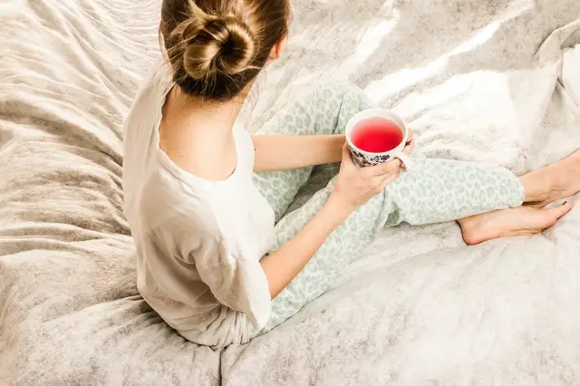 Woman With Morning Bed Tea