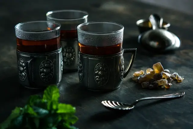 Three Clear Mugs With Black Tea