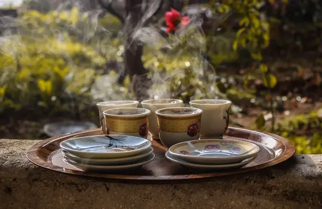 White Floral Tea Cups and Saucers