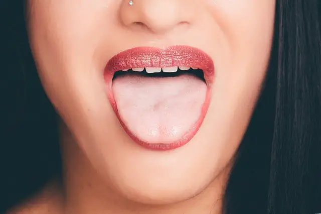 Woman with wide open mouth
