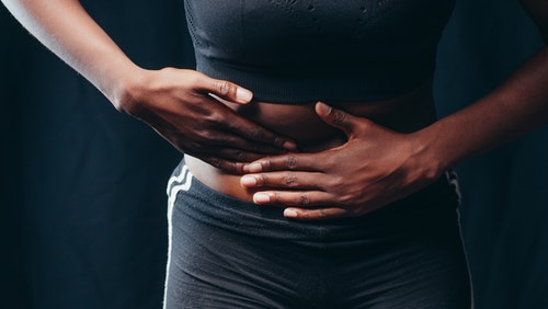 Woman practicing tummy workouts